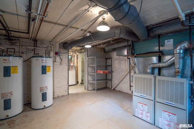 basement with washer / dryer, heating unit, and water heater