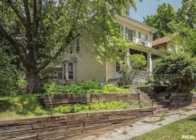 view of front of house featuring covered porch