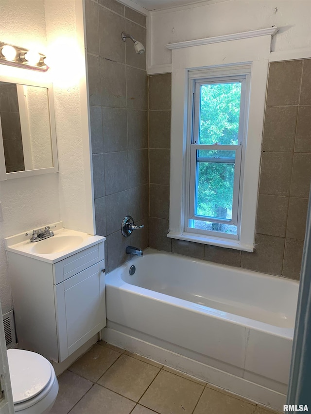 full bath featuring toilet, shower / bathing tub combination, vanity, and tile patterned floors