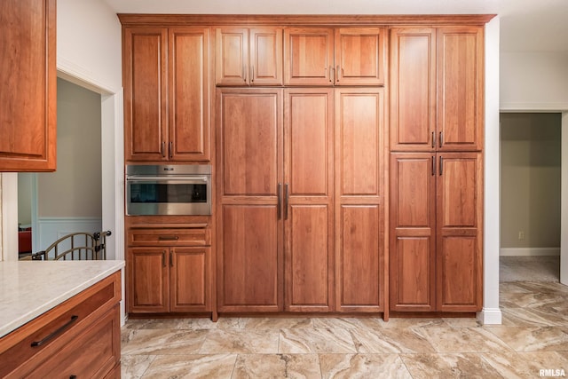 kitchen featuring stainless steel oven