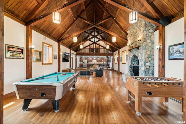 game room with wood ceiling, high vaulted ceiling, hardwood / wood-style floors, and beamed ceiling