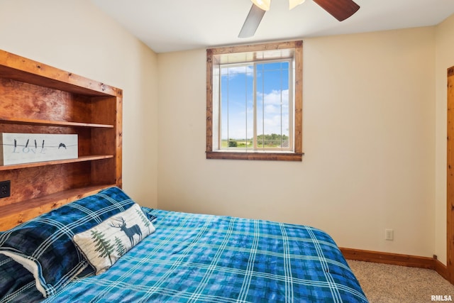 bedroom featuring ceiling fan and carpet flooring