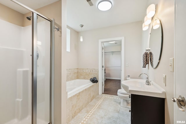 full bathroom with vanity, tile patterned floors, plus walk in shower, and toilet