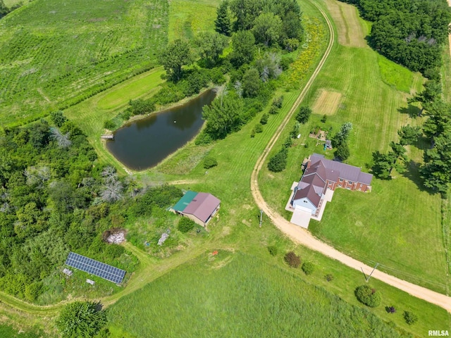 drone / aerial view with a water view and a rural view