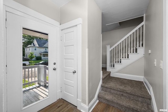 foyer entrance with hardwood / wood-style floors