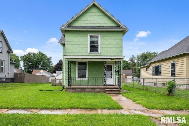 view of front of house featuring covered porch and a front lawn