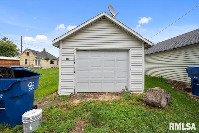 garage with a lawn