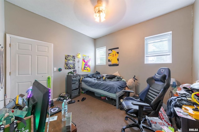 carpeted bedroom with ceiling fan