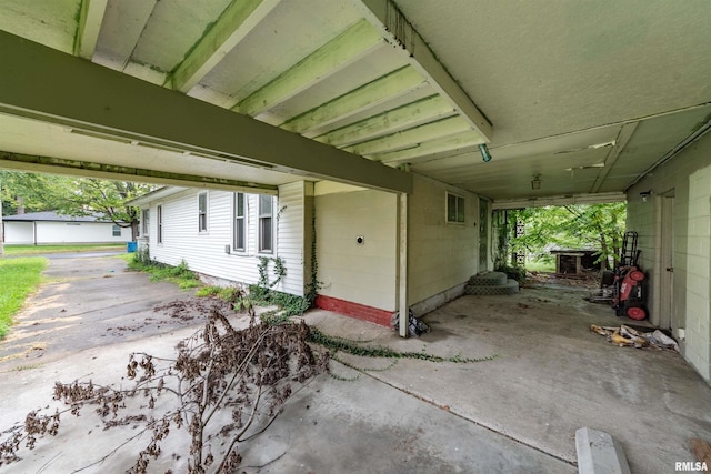 exterior space featuring a carport