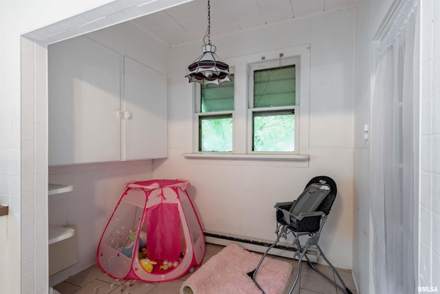 bathroom with baseboard heating