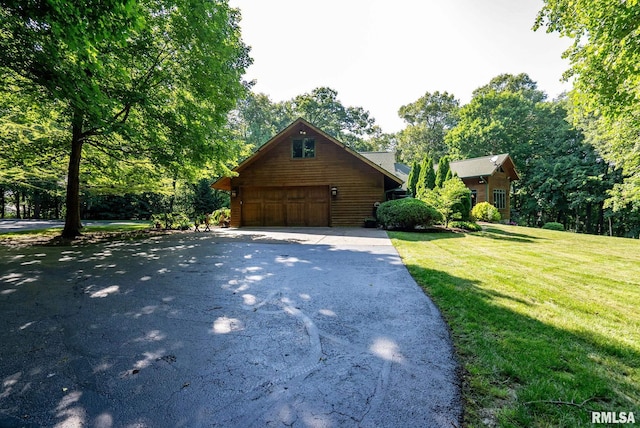 view of property exterior featuring a yard