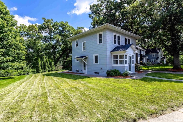 exterior space with a lawn