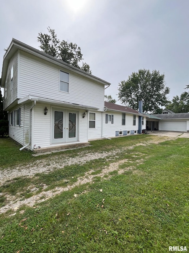 view of property featuring a front lawn