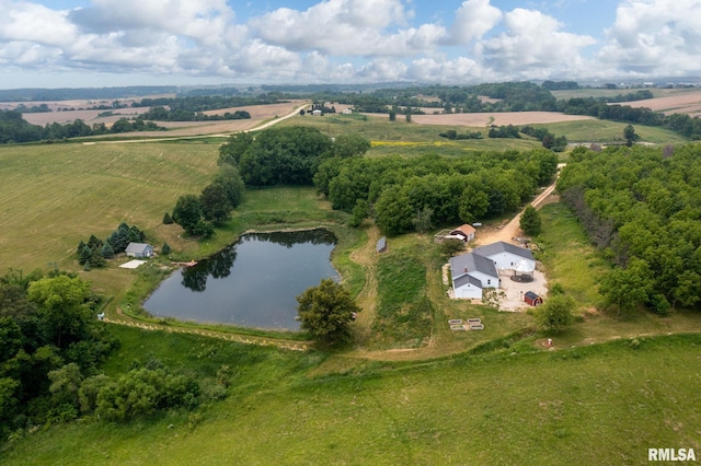 drone / aerial view featuring a rural view and a water view