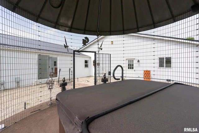 view of patio featuring fence