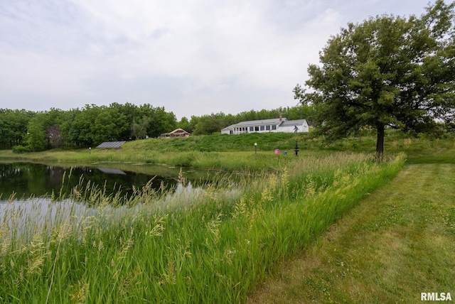 view of local wilderness with a water view