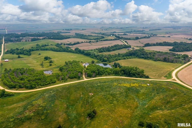 birds eye view of property featuring a rural view