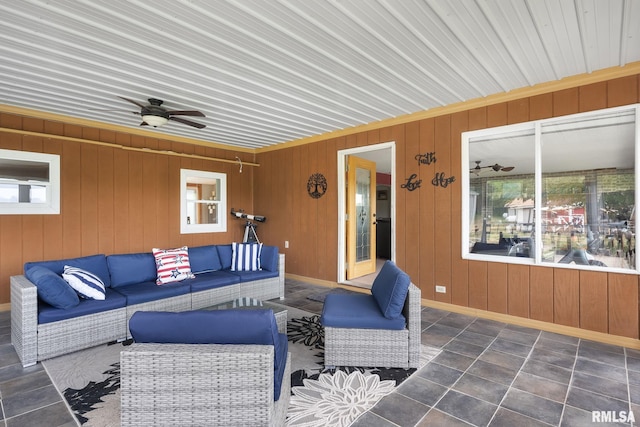 view of patio featuring an outdoor living space and a ceiling fan