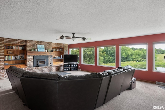 living room with plenty of natural light, visible vents, and carpet flooring