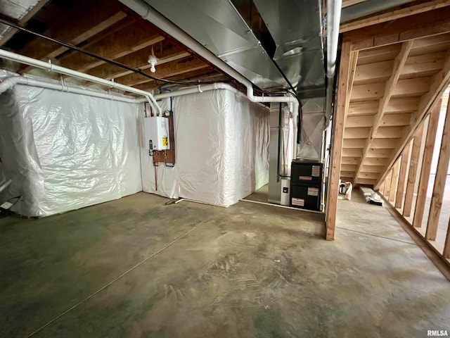 basement with heating unit and water heater