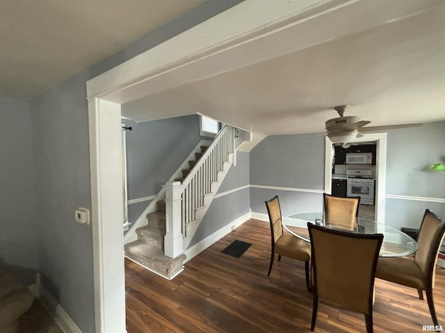 dining area featuring ceiling fan and wood-type flooring