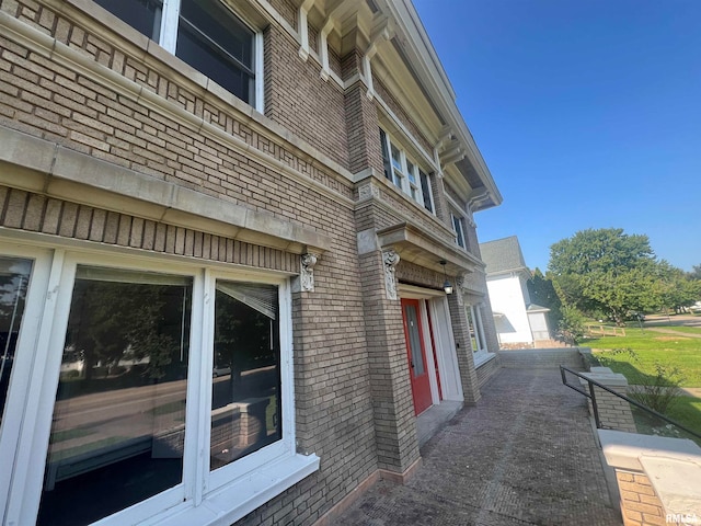 view of side of property featuring a garage