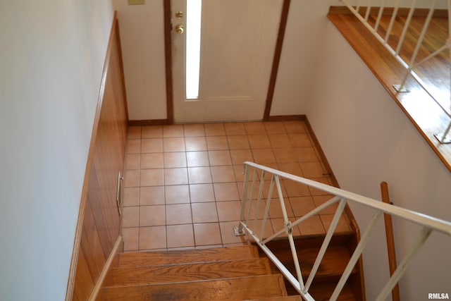 interior space with tile patterned floors and plenty of natural light