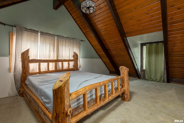 carpeted bedroom featuring wood ceiling and lofted ceiling with beams