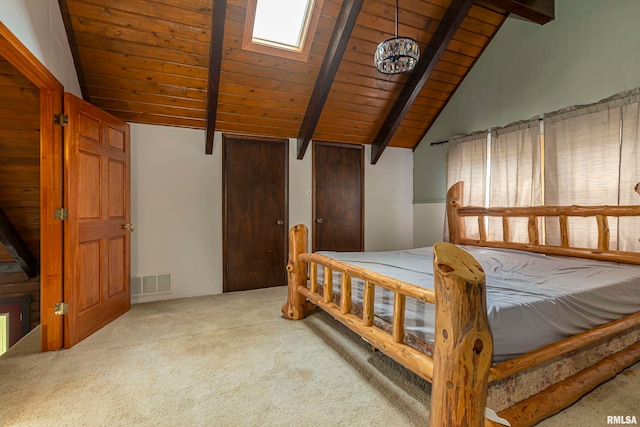 bedroom featuring vaulted ceiling with beams, carpet, and wood ceiling