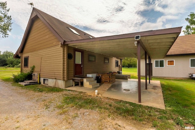 rear view of house featuring a patio