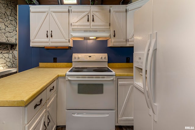 kitchen featuring wall chimney range hood, white appliances, and white cabinets