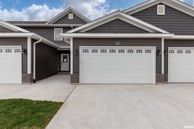 craftsman inspired home with a garage