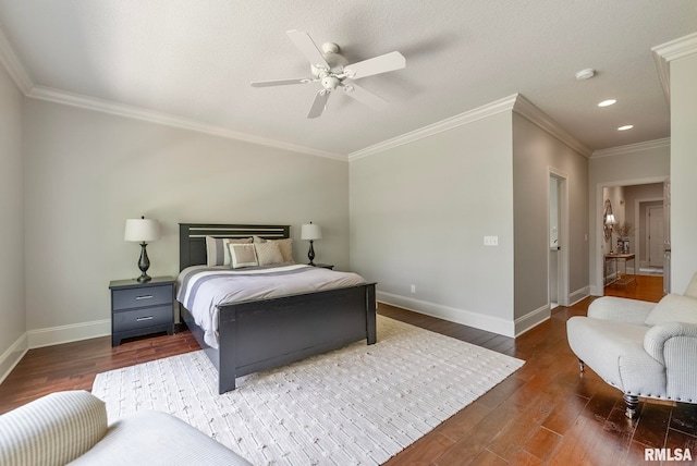 bedroom with hardwood / wood-style flooring, ceiling fan, and ornamental molding