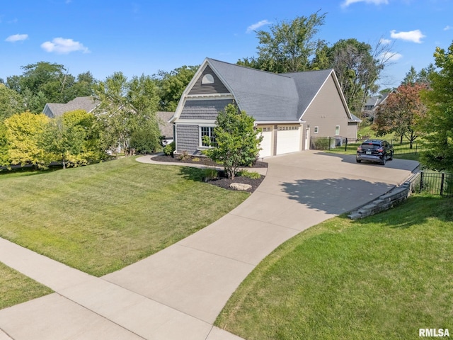 view of front of house with a front lawn and a garage