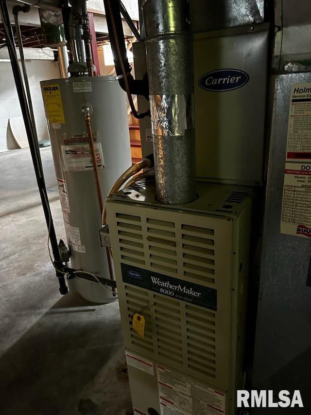 utilities featuring gas water heater and heating unit