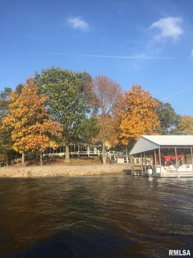 exterior space with a water view