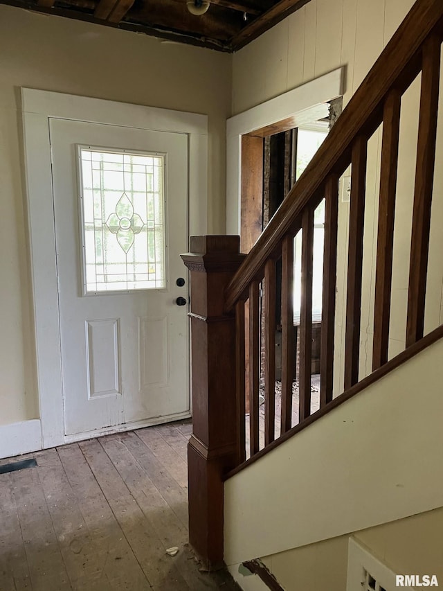 entrance foyer with wood-type flooring and stairway