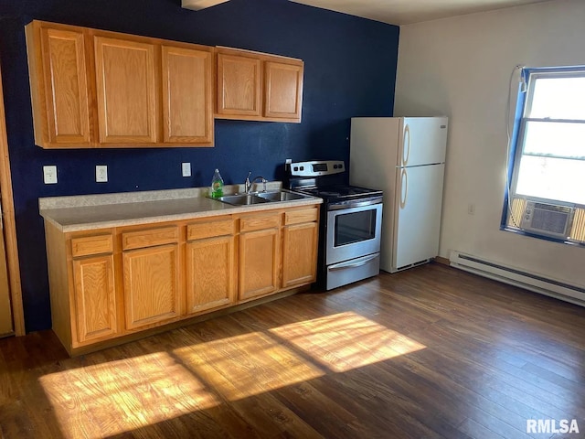 kitchen with light hardwood / wood-style floors, sink, baseboard heating, white refrigerator, and stainless steel range with electric cooktop