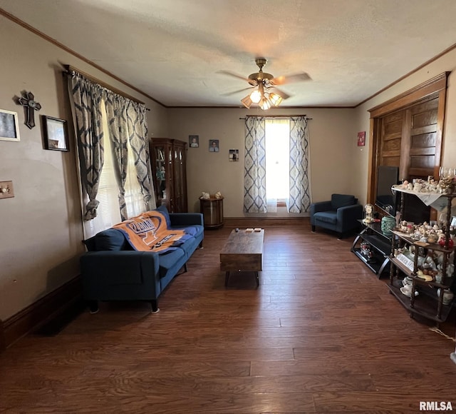 interior space featuring ceiling fan, dark hardwood / wood-style floors, and a textured ceiling