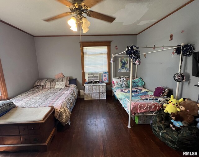 bedroom with ceiling fan, dark hardwood / wood-style floors, and crown molding