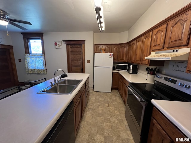 kitchen featuring ceiling fan, sink, and appliances with stainless steel finishes