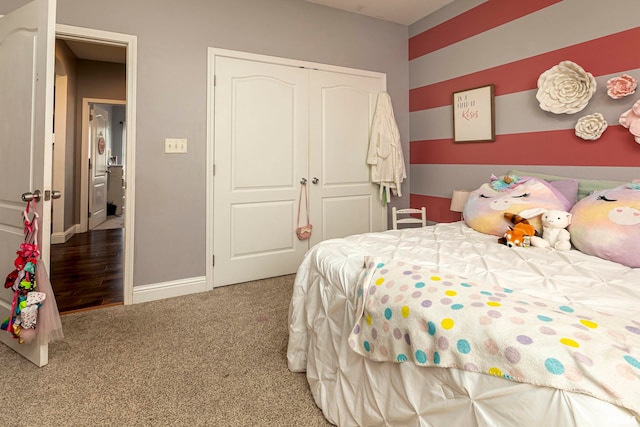 carpeted bedroom featuring a closet