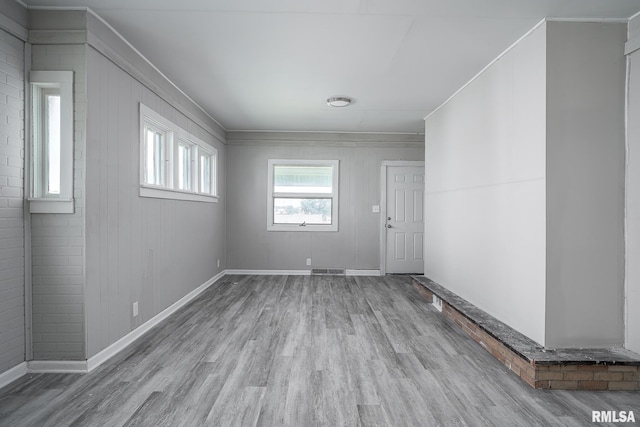 empty room featuring wood-type flooring