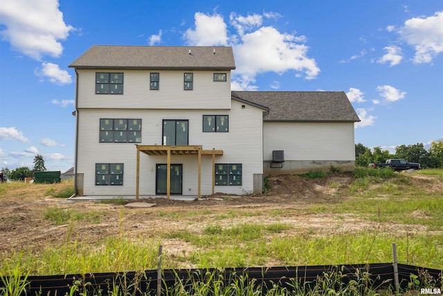 back of house featuring a patio and central AC unit