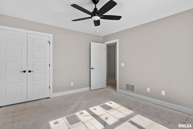 unfurnished bedroom with a closet and ceiling fan