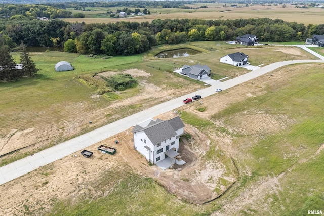 bird's eye view featuring a rural view and a water view