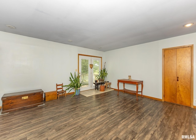 misc room with dark hardwood / wood-style flooring