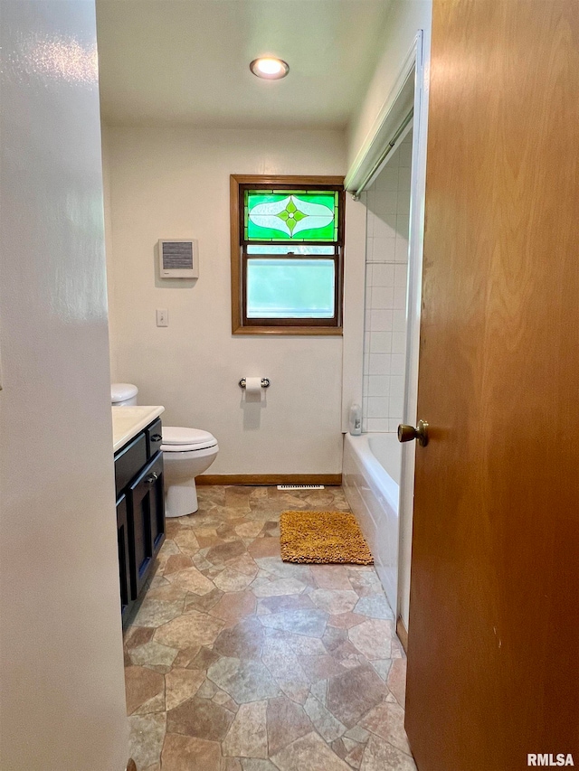 full bathroom featuring vanity, toilet, and separate shower and tub