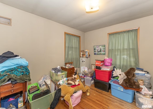 miscellaneous room featuring light wood-type flooring