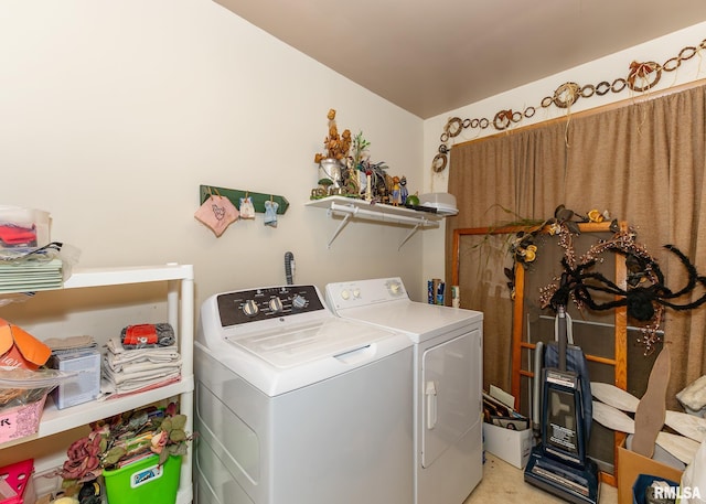 clothes washing area featuring independent washer and dryer